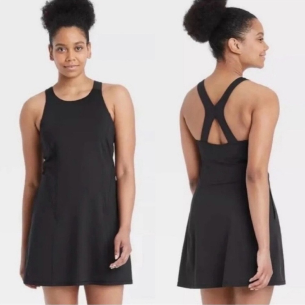 All in motion dress-skort. Dress has pockets & shorts have 2 pockets on legs.